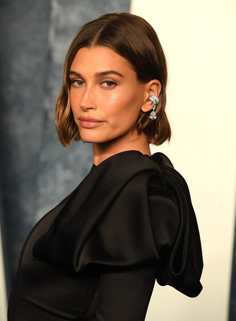 Hailey Bieber arrives at the Vanity Fair Oscar Party