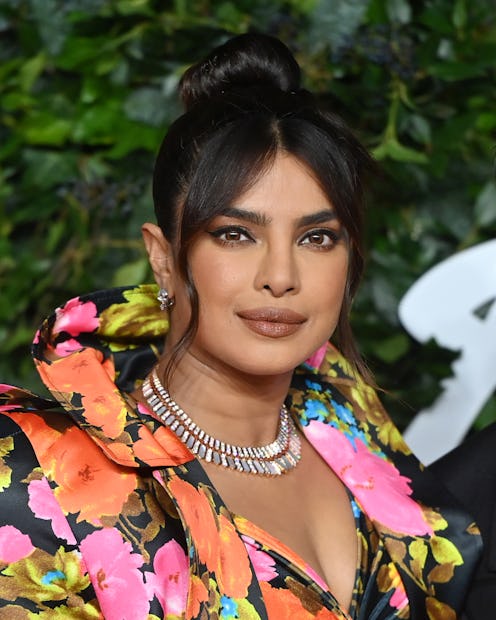 Priyanka Chopra topknot with tendrils