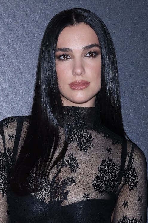 Dua Lipa's red carpet style at Milan Fashion Week Womenswear Fall/Winter 2023/2024 show.