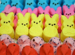 This illustration shows Peeps marshmallows laying on a table in Washington, DC on April 2, 2021. - T...