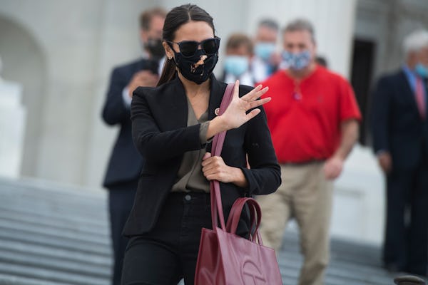 Rep. Alexandria Ocasio-Cortez, D-N.Y., using the Telfar.