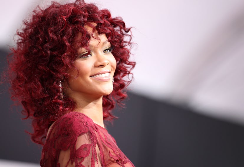 Rihanna matched her red hair and makeup to her outfit in 2010.