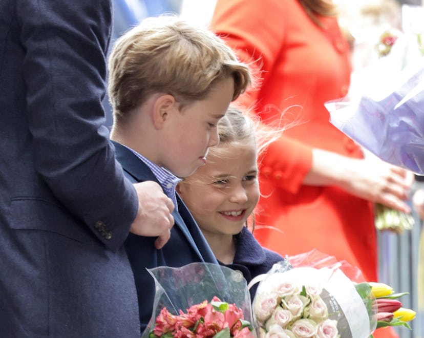 CARDIFF, WALES - JUNE 04: Prince George of Cambridge and Princess Charlotte of Cambridge hold bouque...