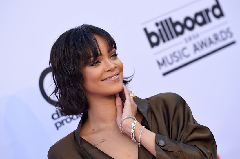 Rihanna in a bob haircut with bangs in 2016.