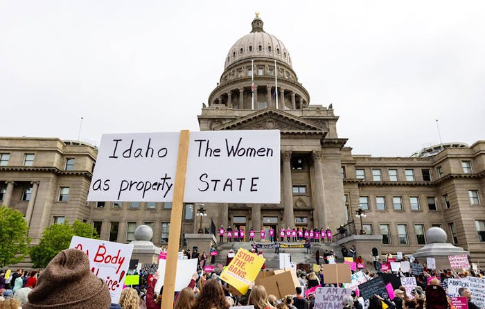 An attendee at Planned Parenthoodâs Bans Off Our Bodies rally for abortion rights holds a sign readi...
