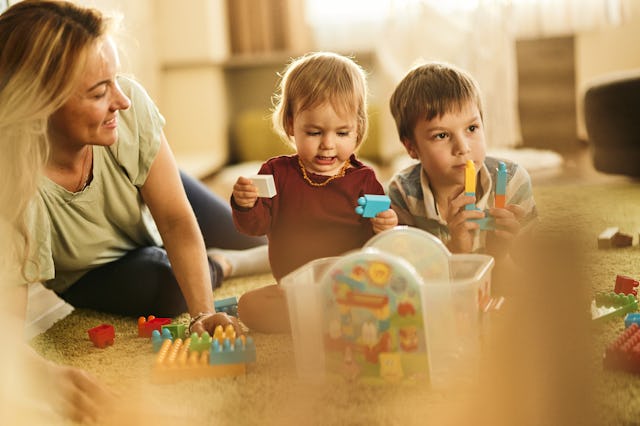 Two children playing together. A mom is searching for a girl named Ava after his son had a blast pla...