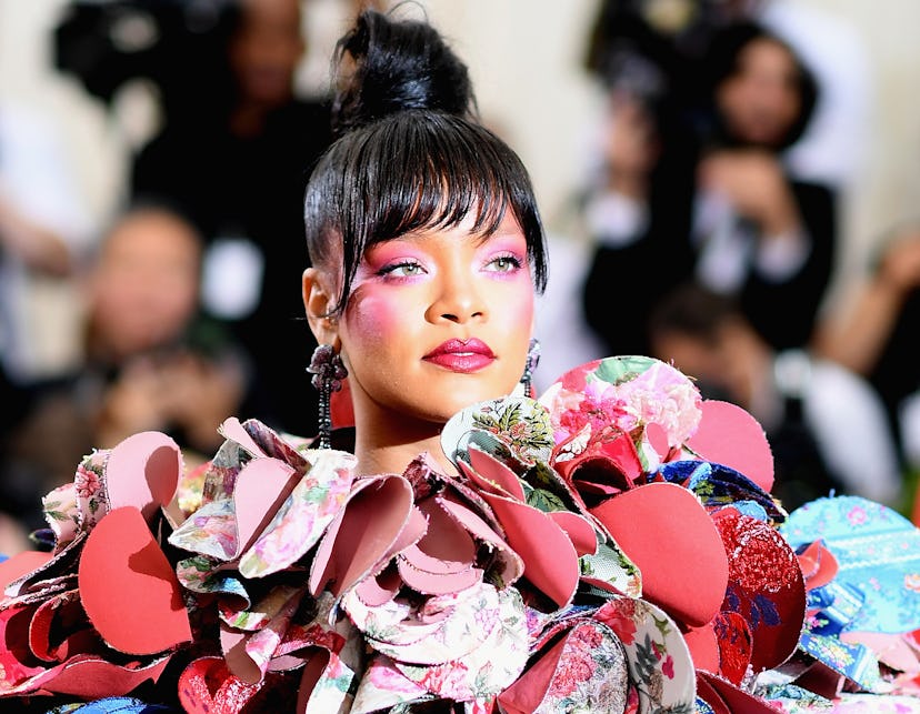 Rihanna wearing draped pink blush at the 2017 Met Gala.