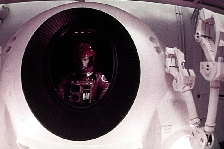 An astronaut looks out the window in a scene from the film '2001: A Space Odyssey', 1968. (Photo by ...