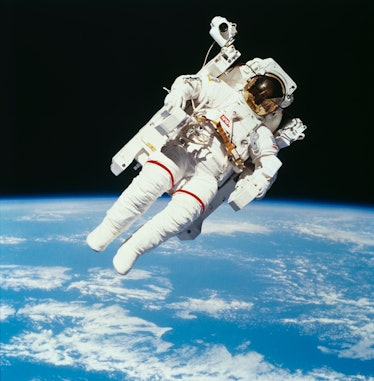 American astronaut Bruce McCandless II photographed from the Space Shuttle Challenger during the fir...
