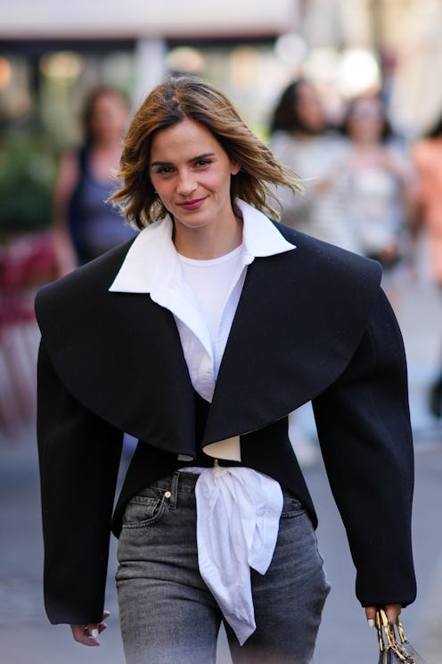 Emma watson wearing a cropped blazer and jeans in Paris