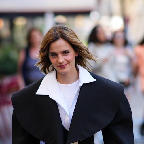 Emma watson wearing a cropped blazer and jeans in Paris