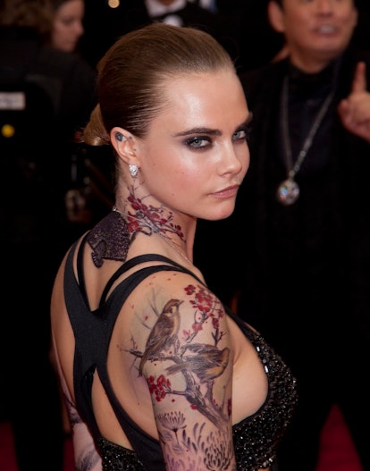 Cara Delevingne attends "China: Through the Looking Glass" 2015 Costume Institute Benefit Gala.