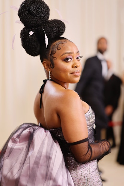 Quinta Brunson at Met Gala with braided puff sculpted updo