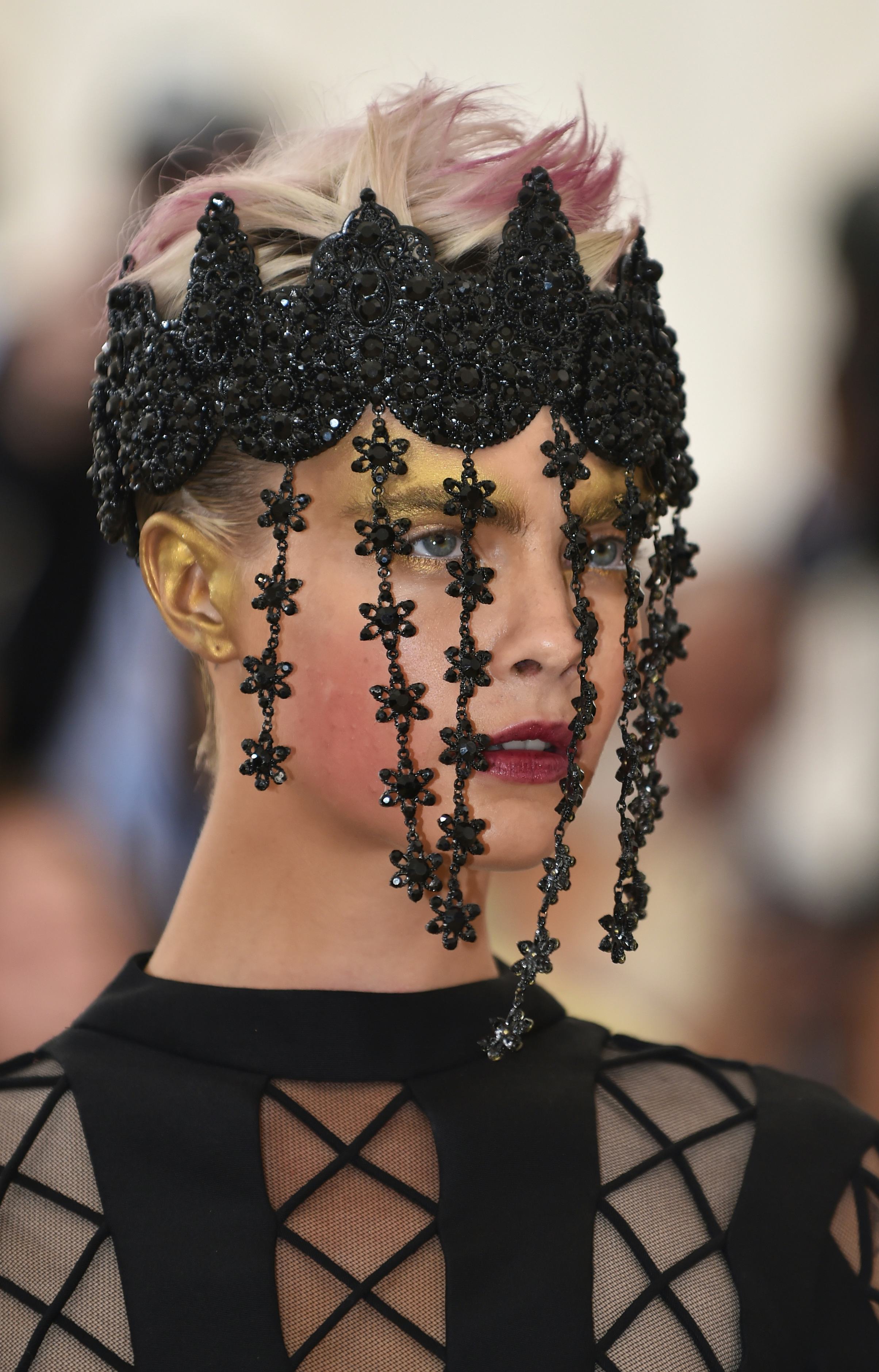 Cara Delevingne arrives for the 2018 &ldquo;Heavenly Bodies&rdquo; Met Gala.
