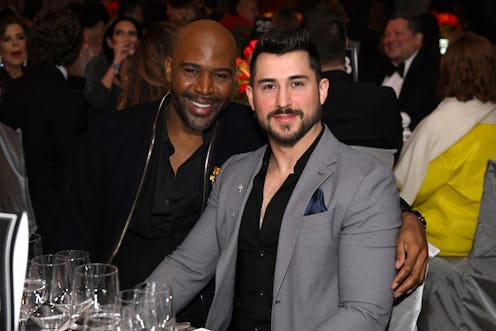 WEST HOLLYWOOD, CALIFORNIA - MARCH 12: (L-R) Karamo Brown and Carlos Medel attend the Elton John AID...