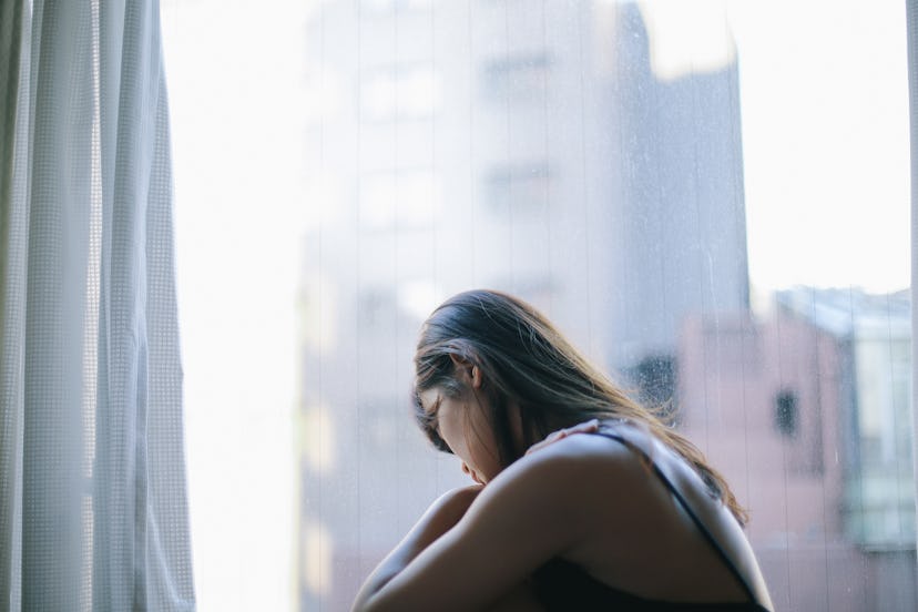 an anxious women experiencing anxiety during ovulation