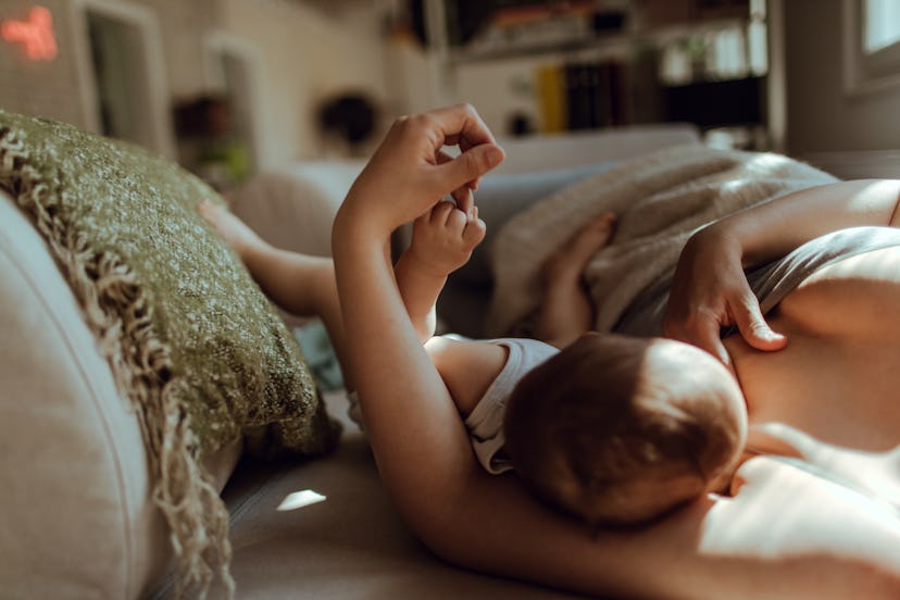 Breastfeeding in the morning, this mother may feel touched out.