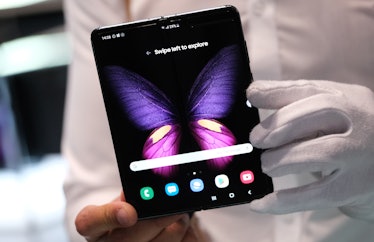 BERLIN, GERMANY - SEPTEMBER 05: A stand host displays the new Samsung Galaxy Fold smartphone at the ...