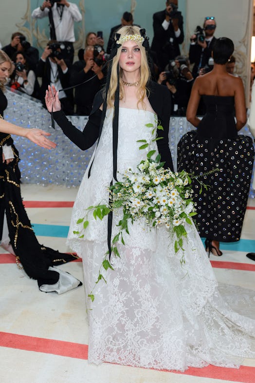 Elle Fanning attends The 2023 Met Gala Celebrating "Karl Lagerfeld: A Line Of Beauty" 