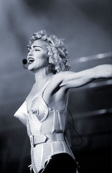 Madonna, Blonde Ambition Tour, She is wearing a Jean Paul Gaultier conical bra corset, Feyenoord Sta...