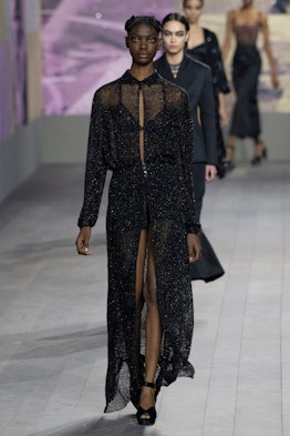 A model walks the runway during the Dior Haute Couture Spring/Summer 2023 fashion show as part of th...