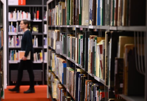 PRODUCTION - 27 February 2023, Saxony, Dresden: Books are shelved in the Central Library of the Muni...