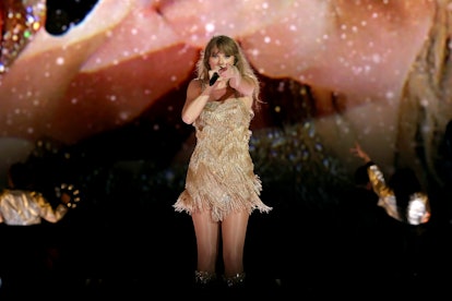 Taylor Swift performing during the 'Eras Tour' to show the 'Eras Tour' surprise song you need to hea...