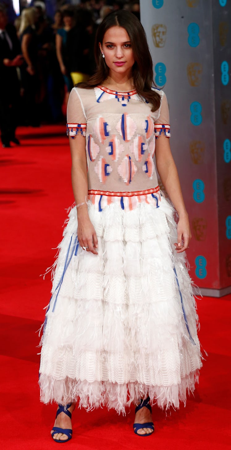 Swedish actress Alicia Vikander arrives on the red carpet for the BAFTA British Academy Film Awards ...