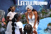LONDON, ENGLAND - MAY 15: Halle Bailey with young fans at the UK Premiere of Disney's "The Little Me...