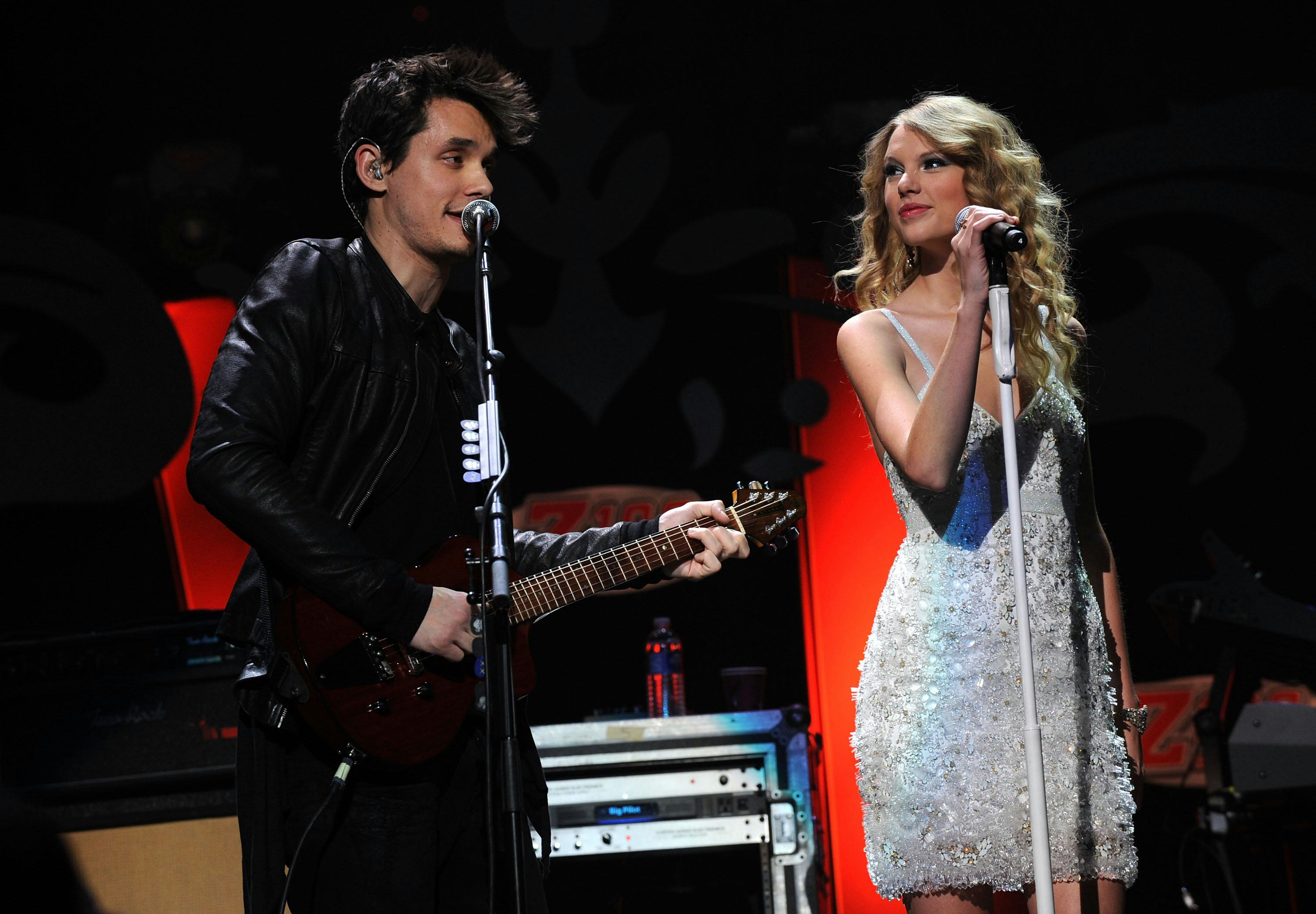 John Mayer and Taylor Swift perform onstage in 2009.