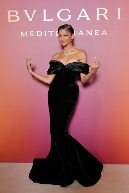 Zendaya wears an off-the-shoulder Richard Quinn black dress at the "Bulgari Mediterranea High Jewelr...