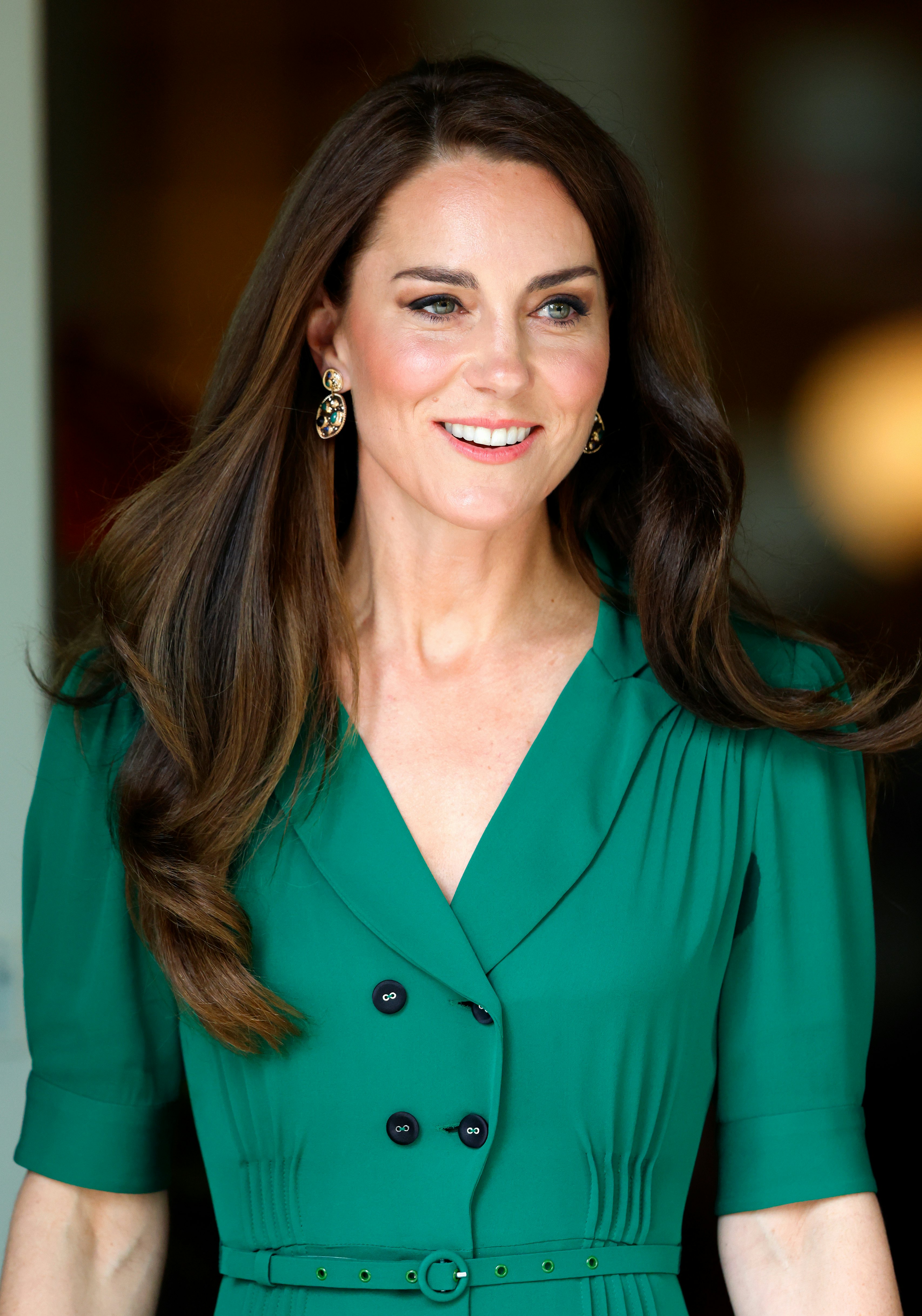 Kate Middleton wears green Suzannah London dress and Alessandra