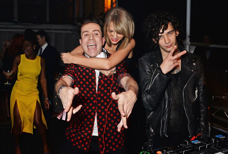Taylor Swift and Matt Healy attend the Universal Music Brits party as fans consider their astrologic...