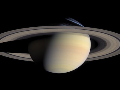 A detailed, global natural color view of Saturn and its rings Cassini. (Photo by: Photo12/Universal ...