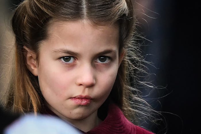 Britain's Princess Charlotte of Wales reacts as she leaves at the end of the Royal Family's traditio...