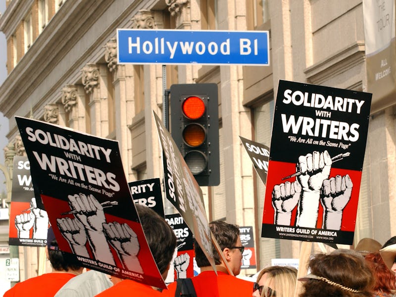 (FILES) This November 20, 2007 photo shows demonstrators holding signs during the 20072008 Writers G...