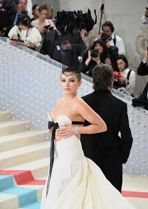 Florence Pugh debuted a shaved head at the 2023 Met Gala celebrating "Karl Lagerfeld: A Line Of Beau...