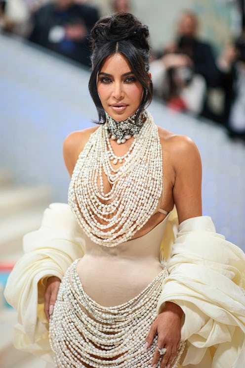 Kim Kardashian attends The 2023 Met Gala covered in pearls