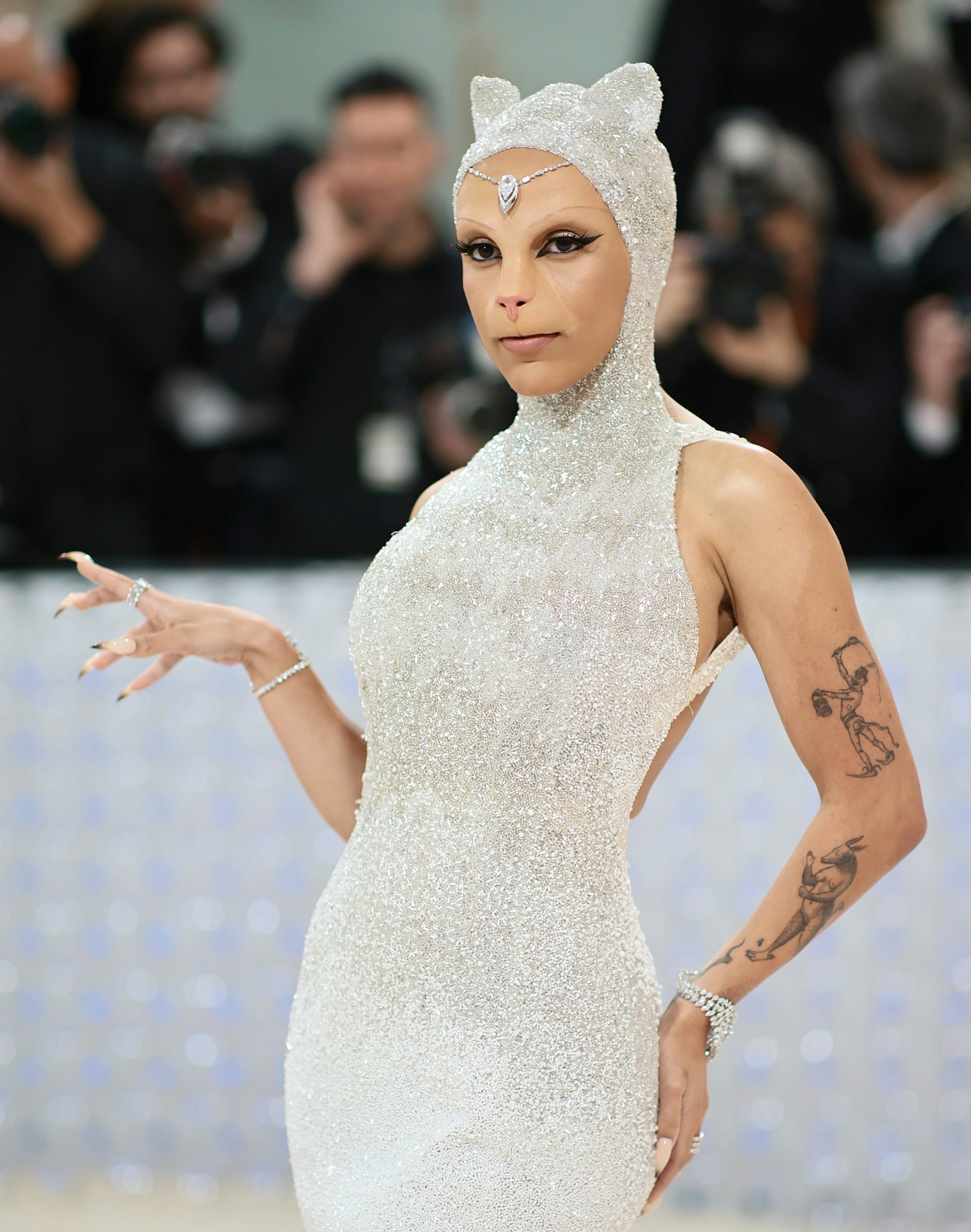 Doja Cat attends the 2023 Met Gala in an outfit tributing Karl Lagerfeld's cat Choupette.