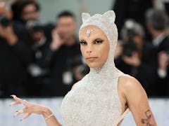 Doja Cat attends the 2023 Met Gala in an outfit tributing Karl Lagerfeld's cat Choupette.