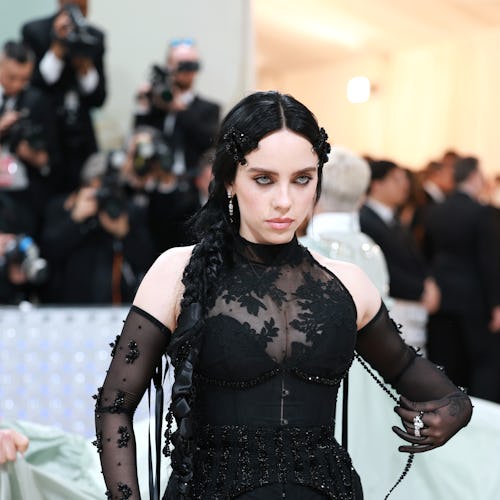 Billie Eilish attends The 2023 Met Gala Celebrating "Karl Lagerfeld: A Line Of Beauty" in a lingerie...