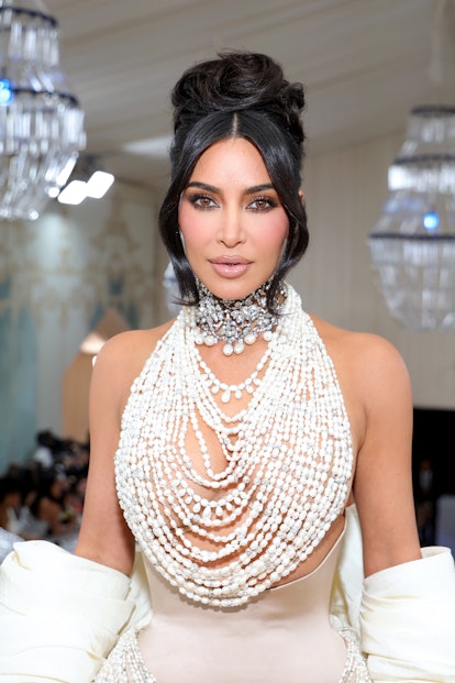 Kim Kardashian wore an updo by Chris Appleton to the 2023 Met Gala celebrating Karl Lagerfeld.