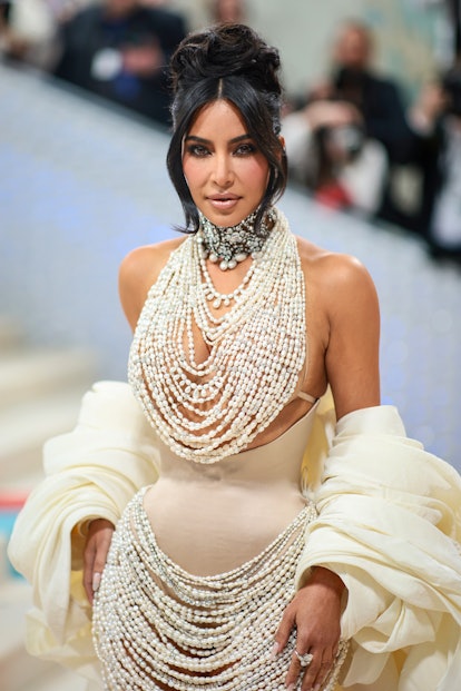 Kim Kardashian at Met Gala 2023 sultry updo with pearls