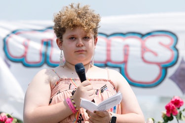 Grayson McFerrin, 12, from Dallas Texas, delivers remarks during the "Trans Youth Prom." 