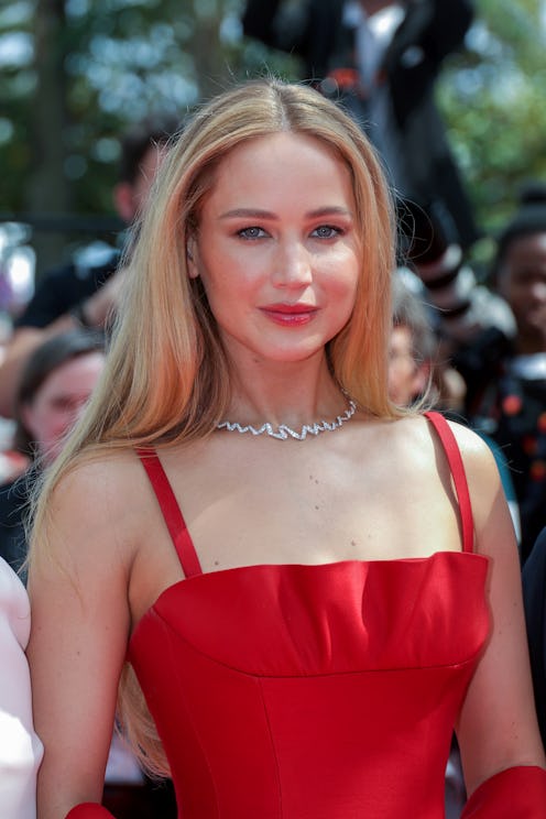 Jennifer Lawrence wears a sleeveless red gown at the "Anatomie D'une Chute (Anatomy Of A Fall)" red ...