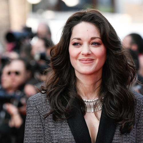 CANNES, FRANCE - MAY 21: Marion Cotillard attends the "Firebrand (Le Jeu De La Reine)" red carpet du...