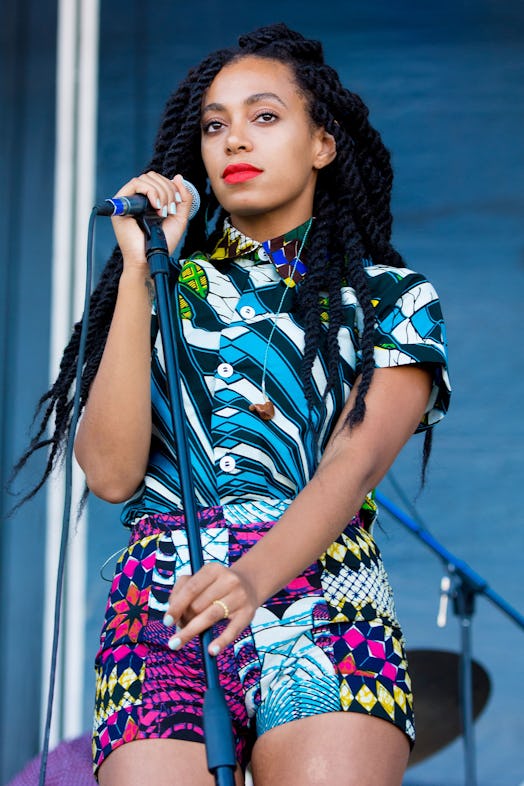 Solange Knowles jumbo marley twists and red lipstick