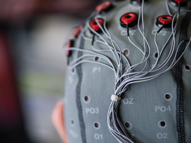 Lausanne, Switzerland - May 27, 2016: Brain-Computer Interface (BCI) hood worn by a test person at a...