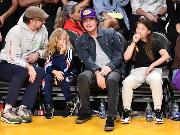 Jason Sudeikis (left) and Jason Bateman (second right) at a Lakers game with their kids with dueling...