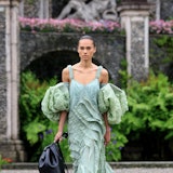 STRESA, ITALY - MAY 24: A model walks the runway at the Louis Vuitton Cruise Show 2024 at Isola Bell...